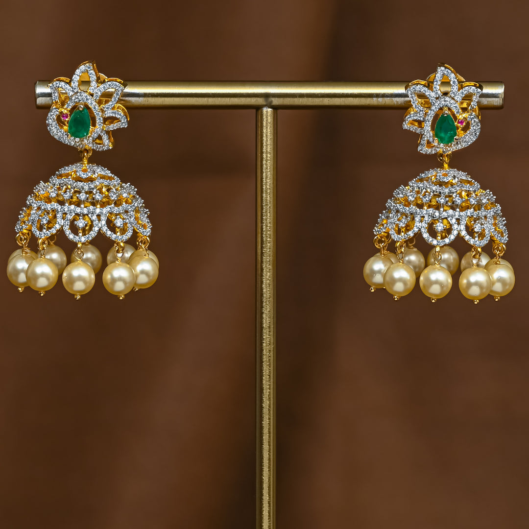 Full view of premium 92.5 silver cz emerald jhumka earrings with intricate detailing and pearl drops by Sri Fine Jewellery, Hyderabad (https://srifinejewellery.com)