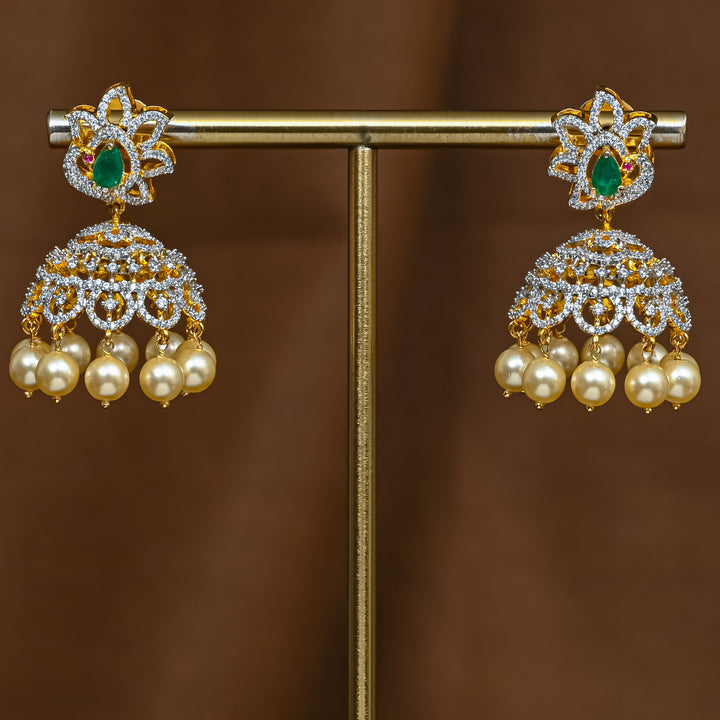 Full view of premium 92.5 silver cz emerald jhumka earrings with intricate detailing and pearl drops by Sri Fine Jewellery, Hyderabad (https://srifinejewellery.com)