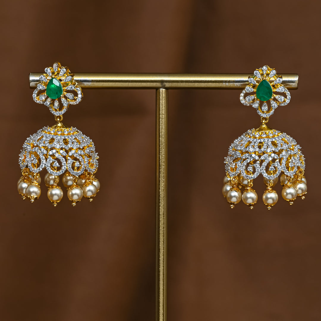 Full view of premium 92.5 silver cz emerald jhumka earrings with intricate detailing and pearl drops by Sri Fine Jewellery, Hyderabad 