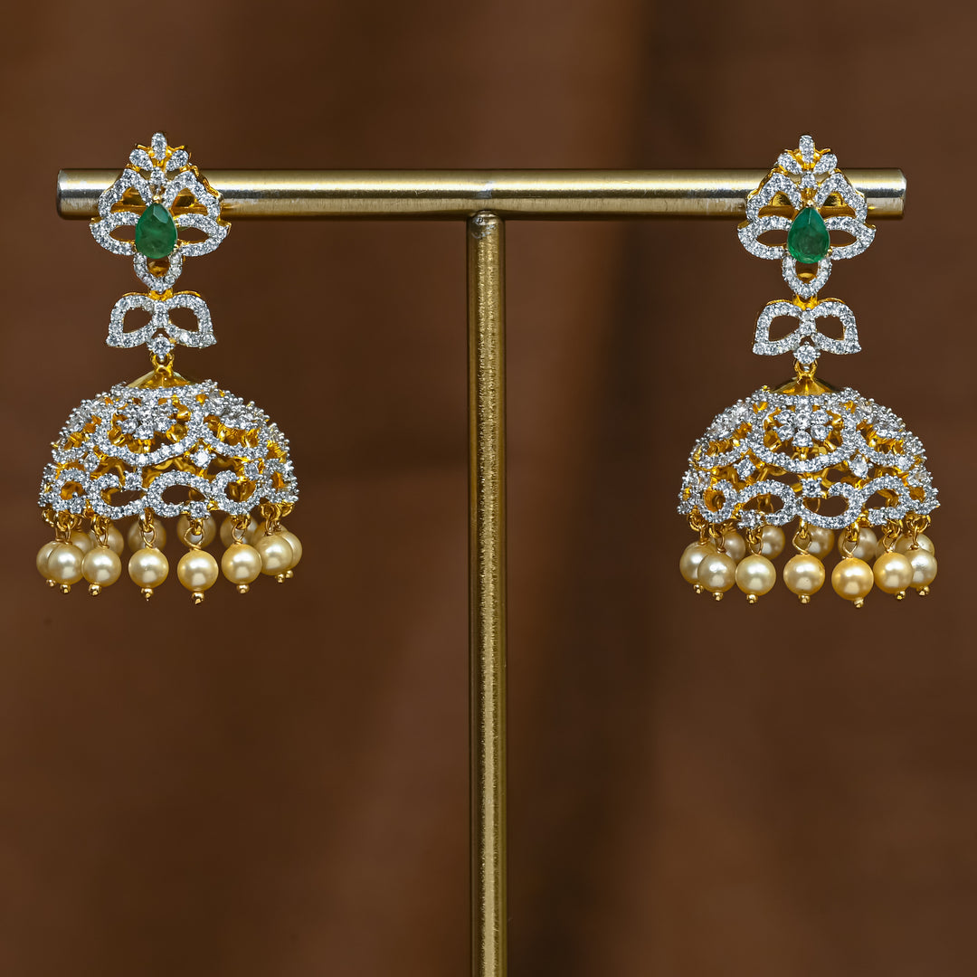 Full view of premium 92.5 silver cz emerald jhumka earrings with intricate detailing and pearl drops by Sri Fine Jewellery, Hyderabad (https://srifinejewellery.com)