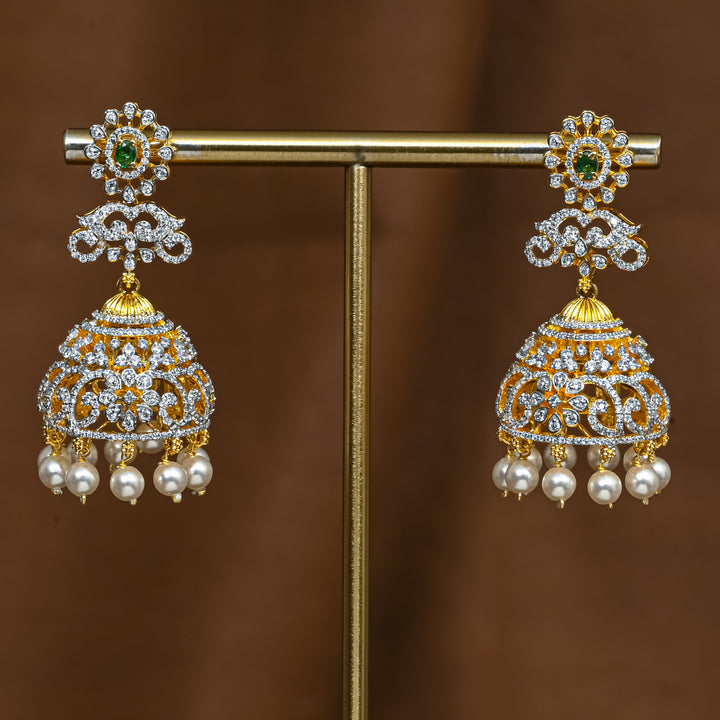 Full view of premium 92.5 silver cz emerald jhumka earrings with intricate detailing and pearl drops by Sri Fine Jewellery, Hyderabad (https://srifinejewellery.com)