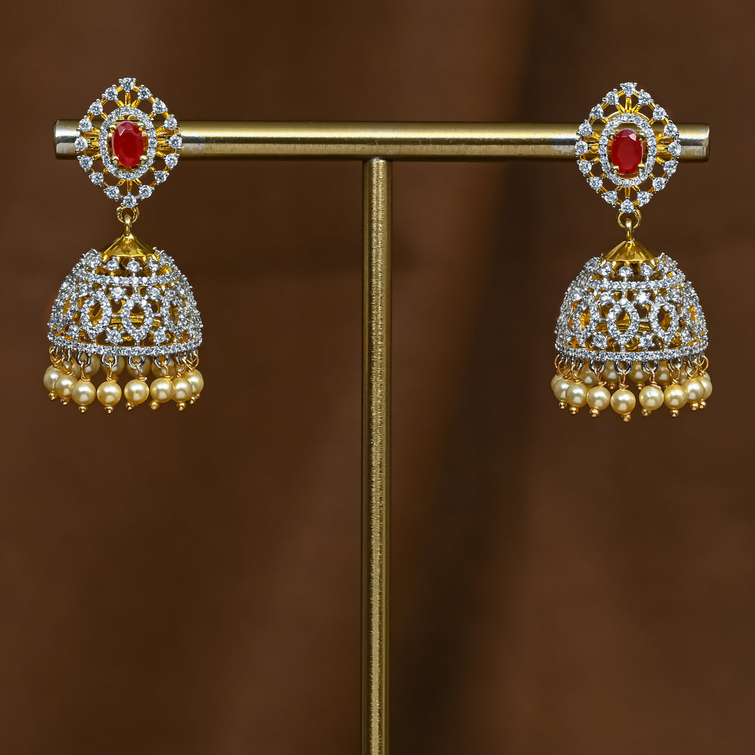 Full view of premium 92.5 silver cz ruby jhumka earrings with intricate detailing and pearl drops by Sri Fine Jewellery, Hyderabad (https://srifinejewellery.com)