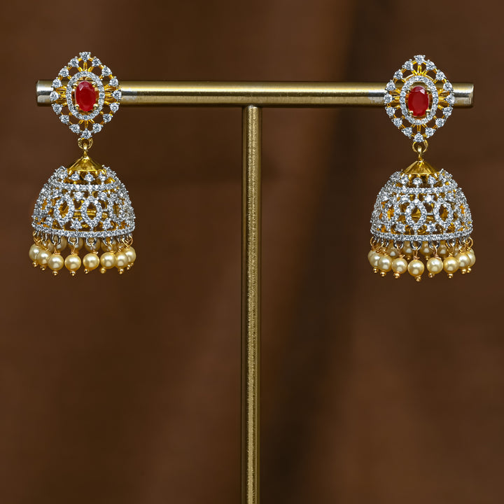 Full view of premium 92.5 silver cz ruby jhumka earrings with intricate detailing and pearl drops by Sri Fine Jewellery, Hyderabad (https://srifinejewellery.com)
