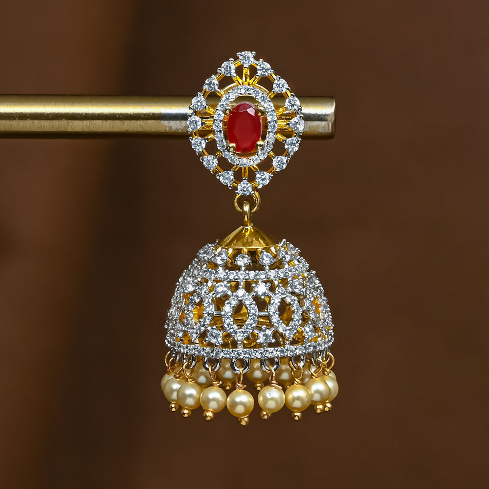 Close-up of premium 92.5 silver cz ruby jhumka earrings with intricate detailing and pearl drops by Sri Fine Jewellery, Hyderabad (https://srifinejewellery.com)