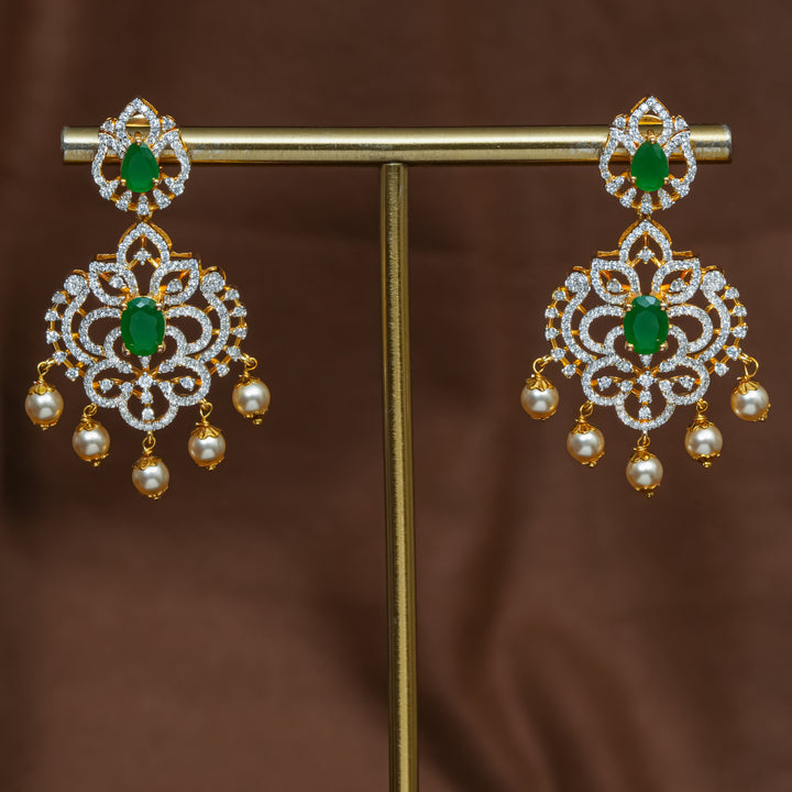 Full view of premium 92.5 silver cz emerald earrings with intricate detailing and pearl drops by Sri Fine Jewellery, Hyderabad (https://srifinejewellery.com)