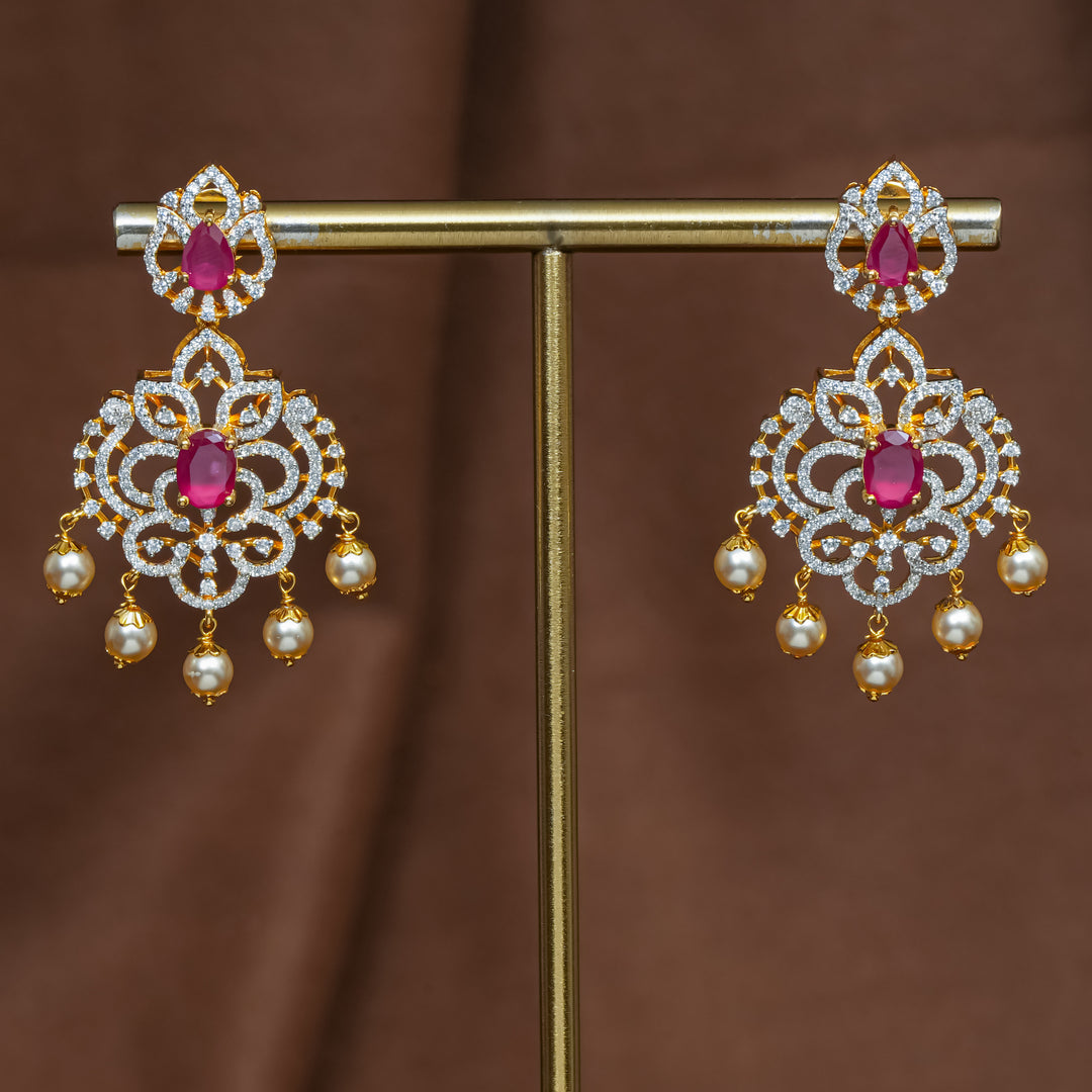 Full view of premium 92.5 silver cz ruby earrings with intricate detailing and pearl drops by Sri Fine Jewellery, Hyderabad (https://srifinejewellery.com)