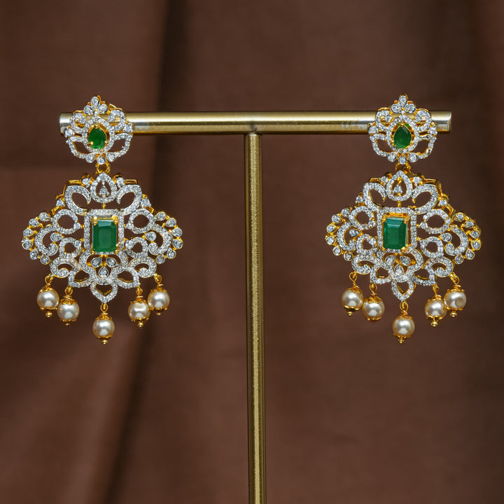 Full view of premium 92.5 silver cz emerald earrings with intricate detailing and pearl drops by Sri Fine Jewellery, Hyderabad (https://srifinejewellery.com)