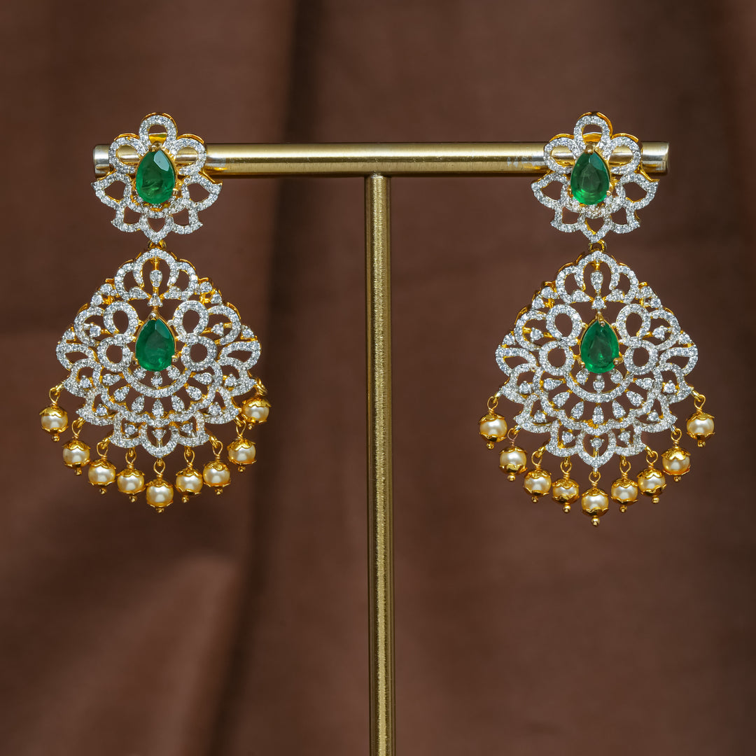Full view of premium 92.5 silver cz emerald earrings with intricate detailing and pearl drops by Sri Fine Jewellery, Hyderabad (https://srifinejewellery.com)