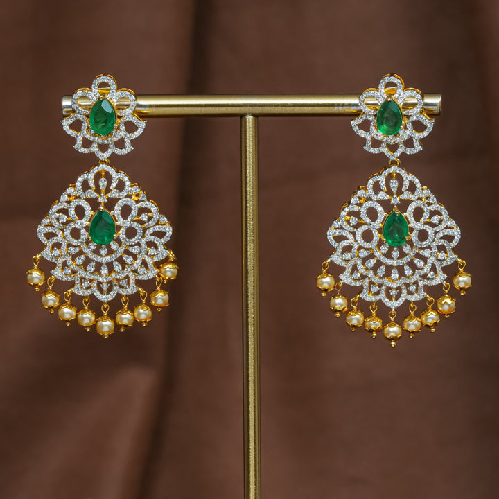 Full view of premium 92.5 silver cz emerald earrings with intricate detailing and pearl drops by Sri Fine Jewellery, Hyderabad (https://srifinejewellery.com)