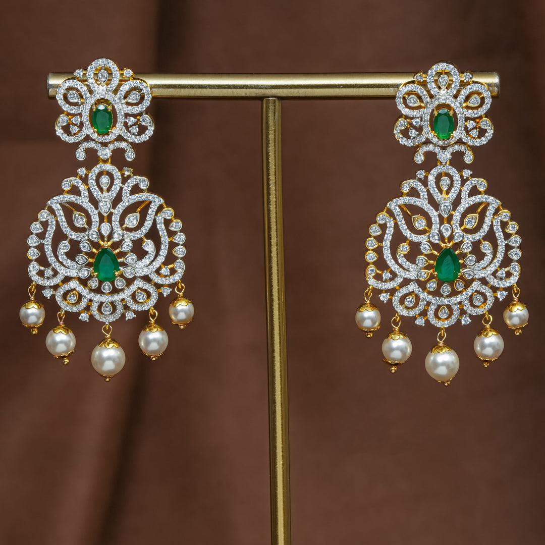 Full view of premium 92.5 silver cz emerald earrings with intricate detailing and pearl drops by Sri Fine Jewellery, Hyderabad (https://srifinejewellery.com)