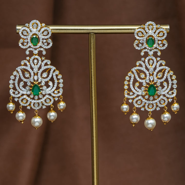 Full view of premium 92.5 silver cz emerald earrings with intricate detailing and pearl drops by Sri Fine Jewellery, Hyderabad (https://srifinejewellery.com)