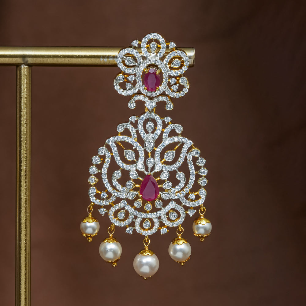 Close-up view of premium 92.5 silver cz ruby earrings with intricate detailing and pearl drops by Sri Fine Jewellery, Hyderabad (https://srifinejewellery.com)