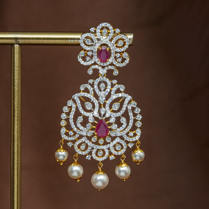 Close-up view of premium 92.5 silver cz ruby earrings with intricate detailing and pearl drops by Sri Fine Jewellery, Hyderabad (https://srifinejewellery.com)
