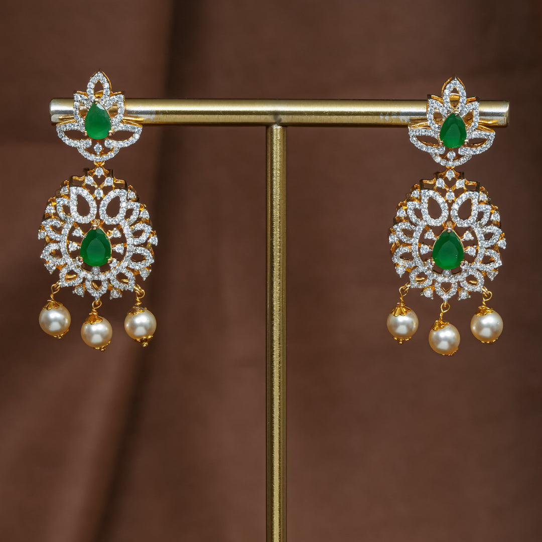 Full view of premium 92.5 silver cz emerald earrings with intricate detailing and pearl drops by Sri Fine Jewellery, Hyderabad (https://srifinejewellery.com)