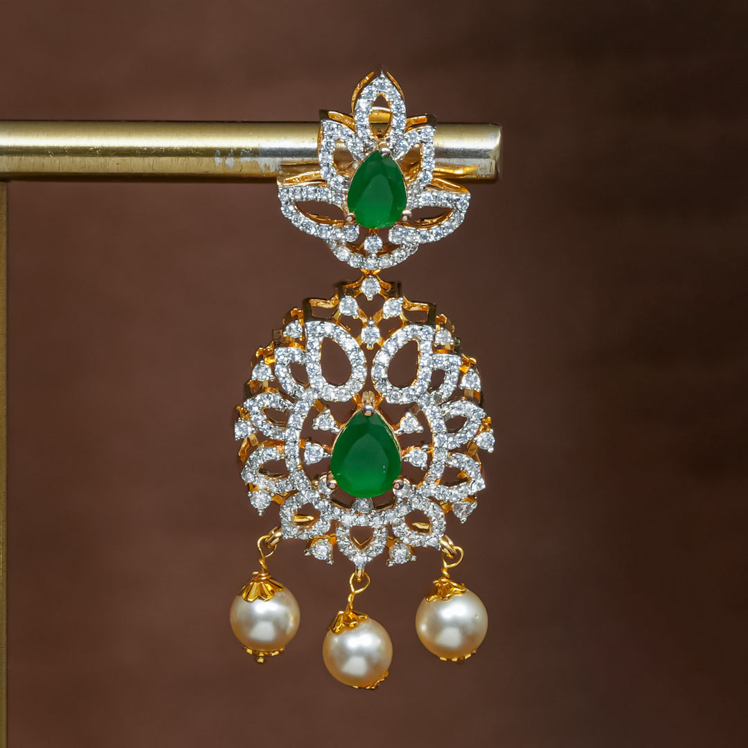 Close-up view of premium 92.5 silver cz emerald earrings with intricate detailing and pearl drops by Sri Fine Jewellery, Hyderabad (https://srifinejewellery.com)