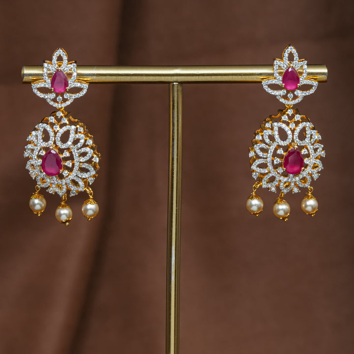 Full view of premium 92.5 silver cz ruby earrings with intricate detailing and pearl drops by Sri Fine Jewellery, Hyderabad (https://srifinejewellery.com)