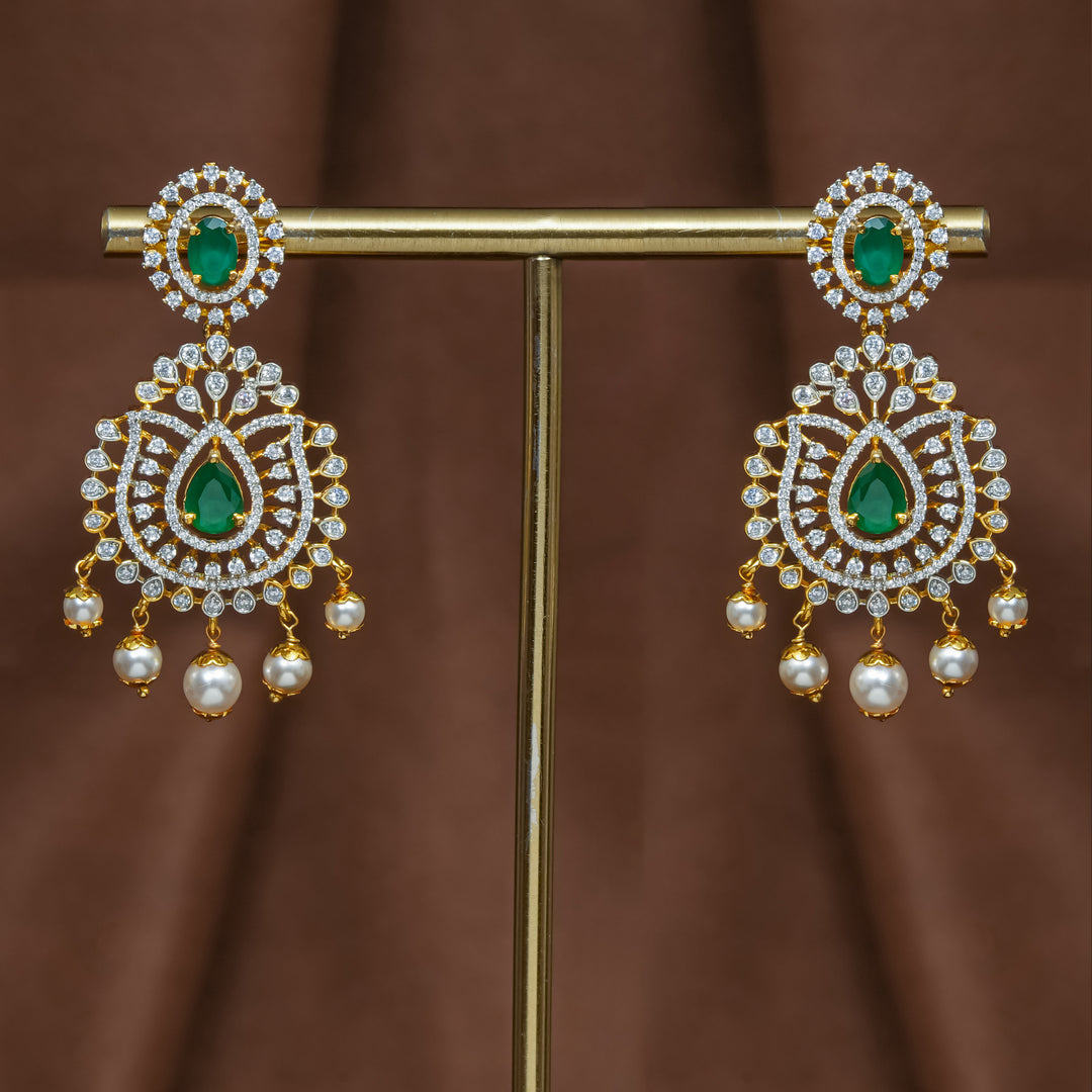 Full view of premium 92.5 silver cz emerald earrings with intricate detailing and pearl drops by Sri Fine Jewellery, Hyderabad (https://srifinejewellery.com)