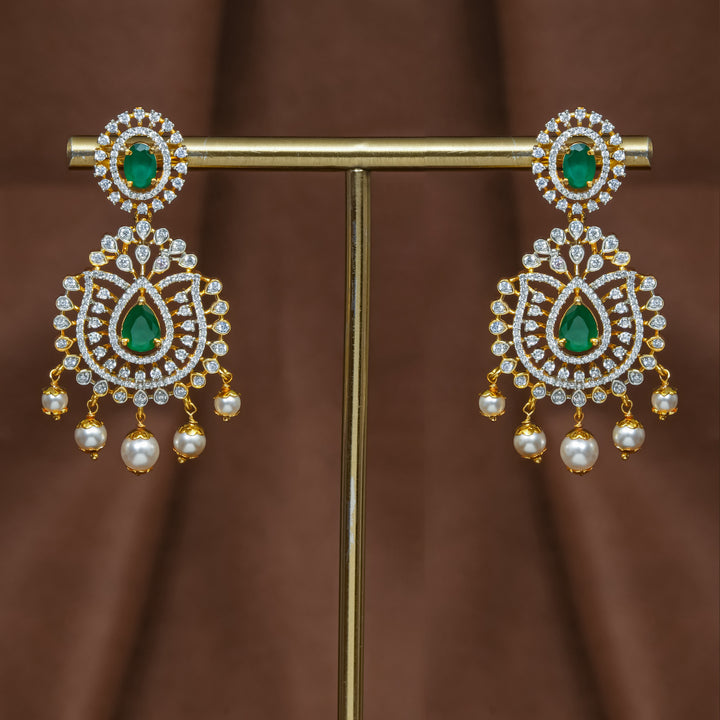 Full view of premium 92.5 silver cz emerald earrings with intricate detailing and pearl drops by Sri Fine Jewellery, Hyderabad (https://srifinejewellery.com)