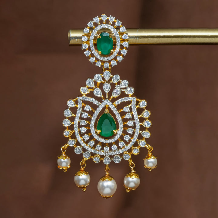 Close-up view of premium 92.5 silver cz emerald earrings with intricate detailing and pearl drops by Sri Fine Jewellery, Hyderabad (https://srifinejewellery.com)