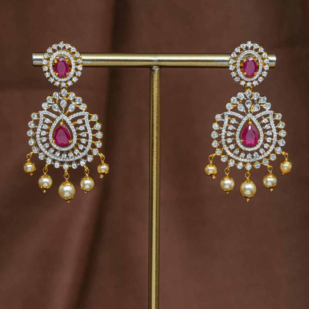 Full view of premium 92.5 silver cz ruby earrings with intricate detailing and pearl drops by Sri Fine Jewellery, Hyderabad (https://srifinejewellery.com)