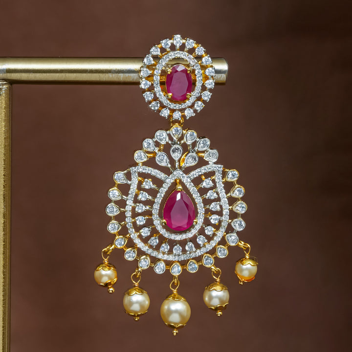 Close-up view of premium 92.5 silver cz ruby earrings with intricate detailing and pearl drops by Sri Fine Jewellery, Hyderabad (https://srifinejewellery.com)