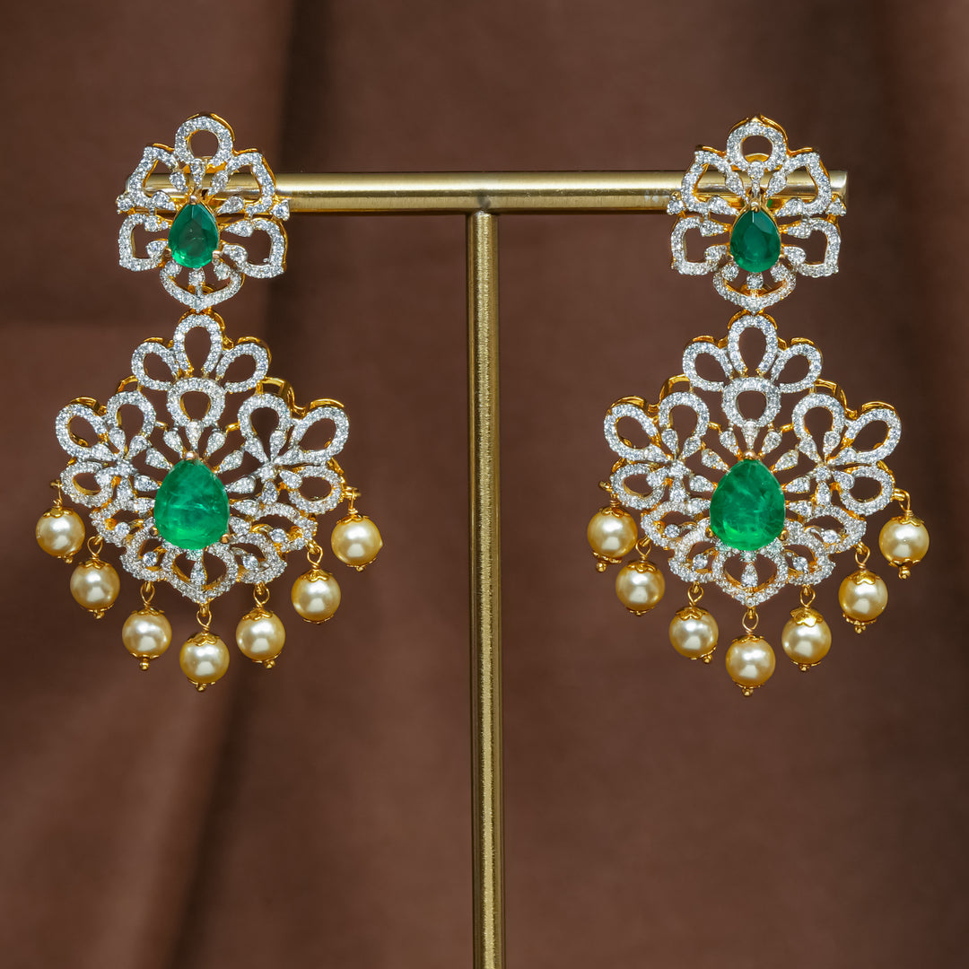 Full view of premium 92.5 silver cz emerald earrings with intricate detailing and pearl drops by Sri Fine Jewellery, Hyderabad (https://srifinejewellery.com)