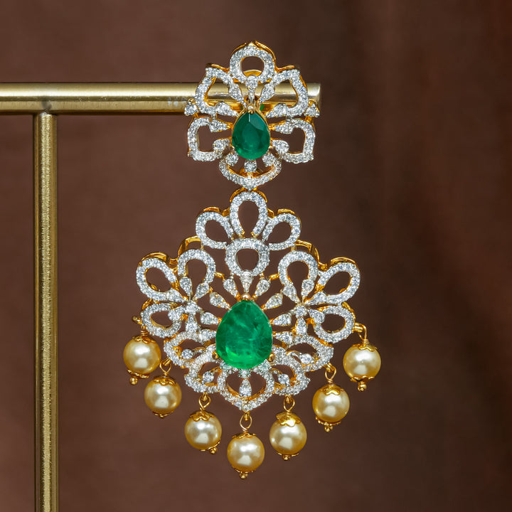 Close-up view of premium 92.5 silver cz emerald earrings with intricate detailing and pearl drops by Sri Fine Jewellery, Hyderabad (https://srifinejewellery.com)