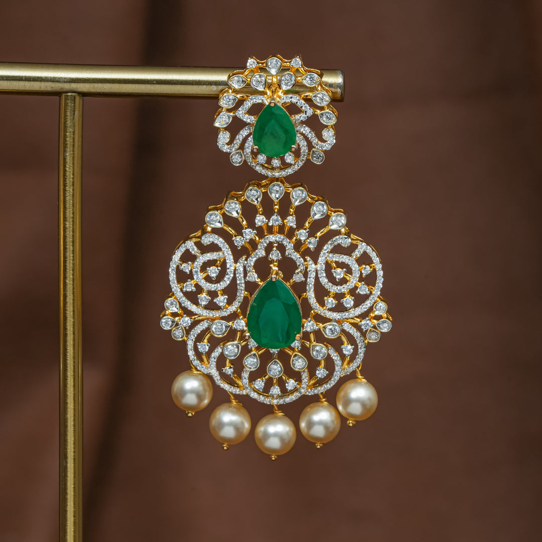Close-up view of premium 92.5 silver cz emerald earrings with intricate detailing and pearl drops by Sri Fine Jewellery, Hyderabad (https://srifinejewellery.com)