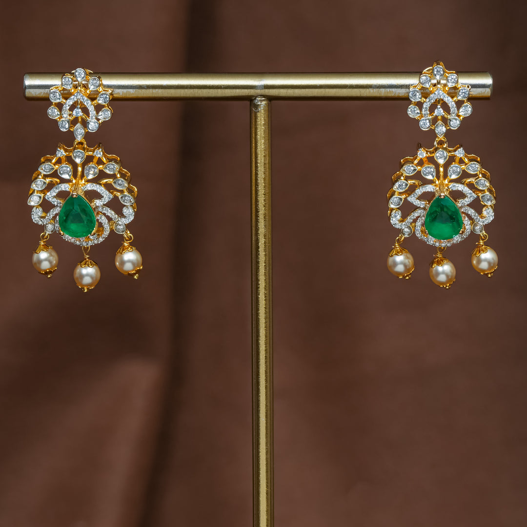 Full view of premium 92.5 silver cz emerald earrings with intricate detailing and pearl drops by Sri Fine Jewellery, Hyderabad (https://srifinejewellery.com)