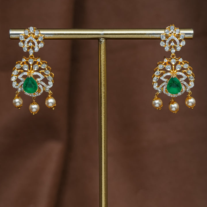 Full view of premium 92.5 silver cz emerald earrings with intricate detailing and pearl drops by Sri Fine Jewellery, Hyderabad (https://srifinejewellery.com)