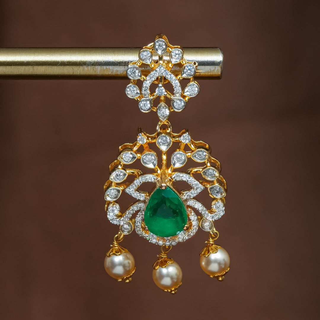 Close-up view of premium 92.5 silver cz emerald earrings with intricate detailing and pearl drops by Sri Fine Jewellery, Hyderabad (https://srifinejewellery.com)