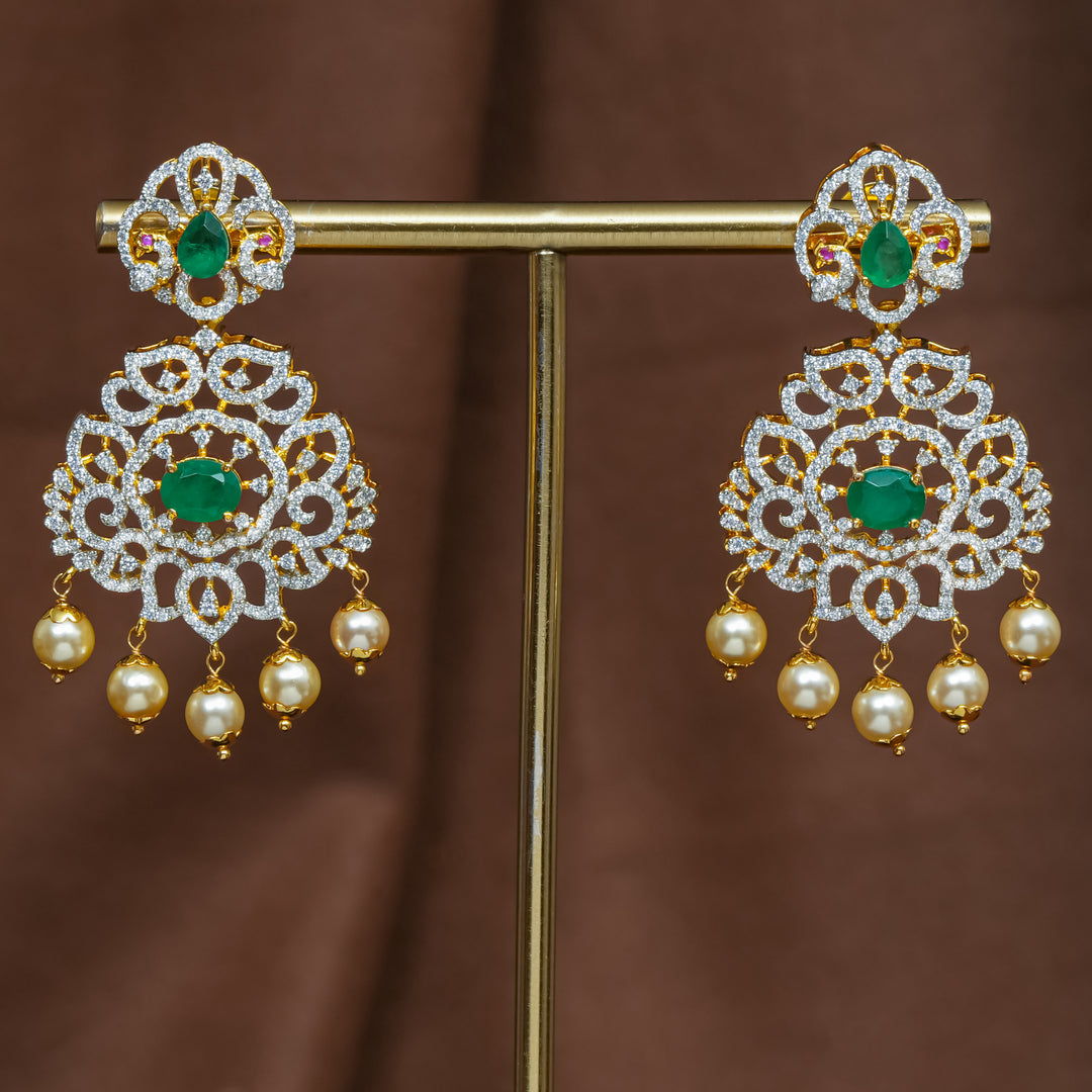 Full view of premium 92.5 silver cz emerald earrings with intricate detailing and pearl drops by Sri Fine Jewellery, Hyderabad (https://srifinejewellery.com)