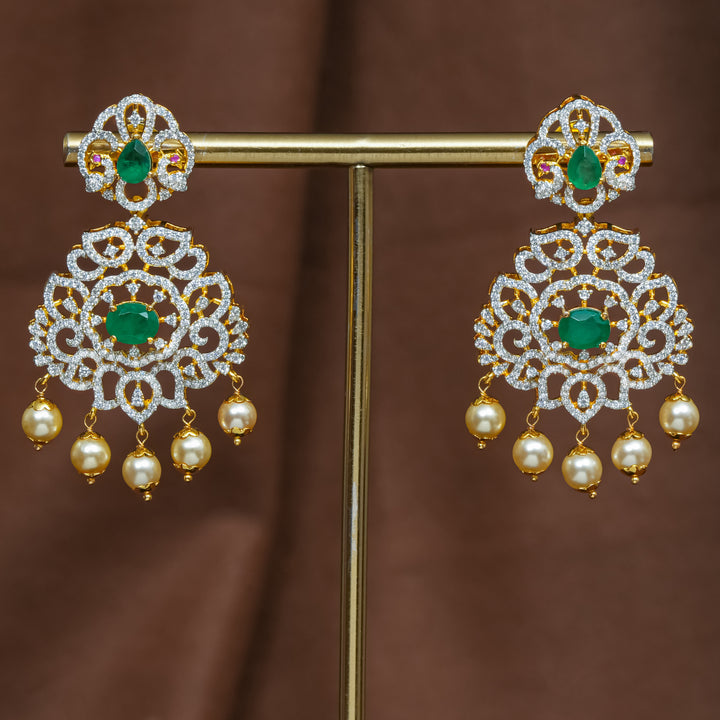 Full view of premium 92.5 silver cz emerald earrings with intricate detailing and pearl drops by Sri Fine Jewellery, Hyderabad (https://srifinejewellery.com)
