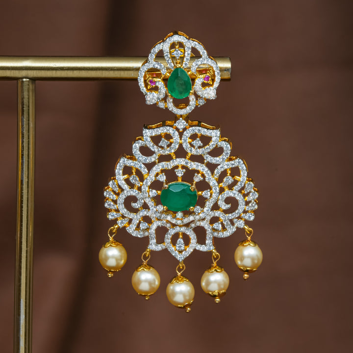 Close-up view of premium 92.5 silver cz emerald earrings with intricate detailing and pearl drops by Sri Fine Jewellery, Hyderabad (https://srifinejewellery.com)