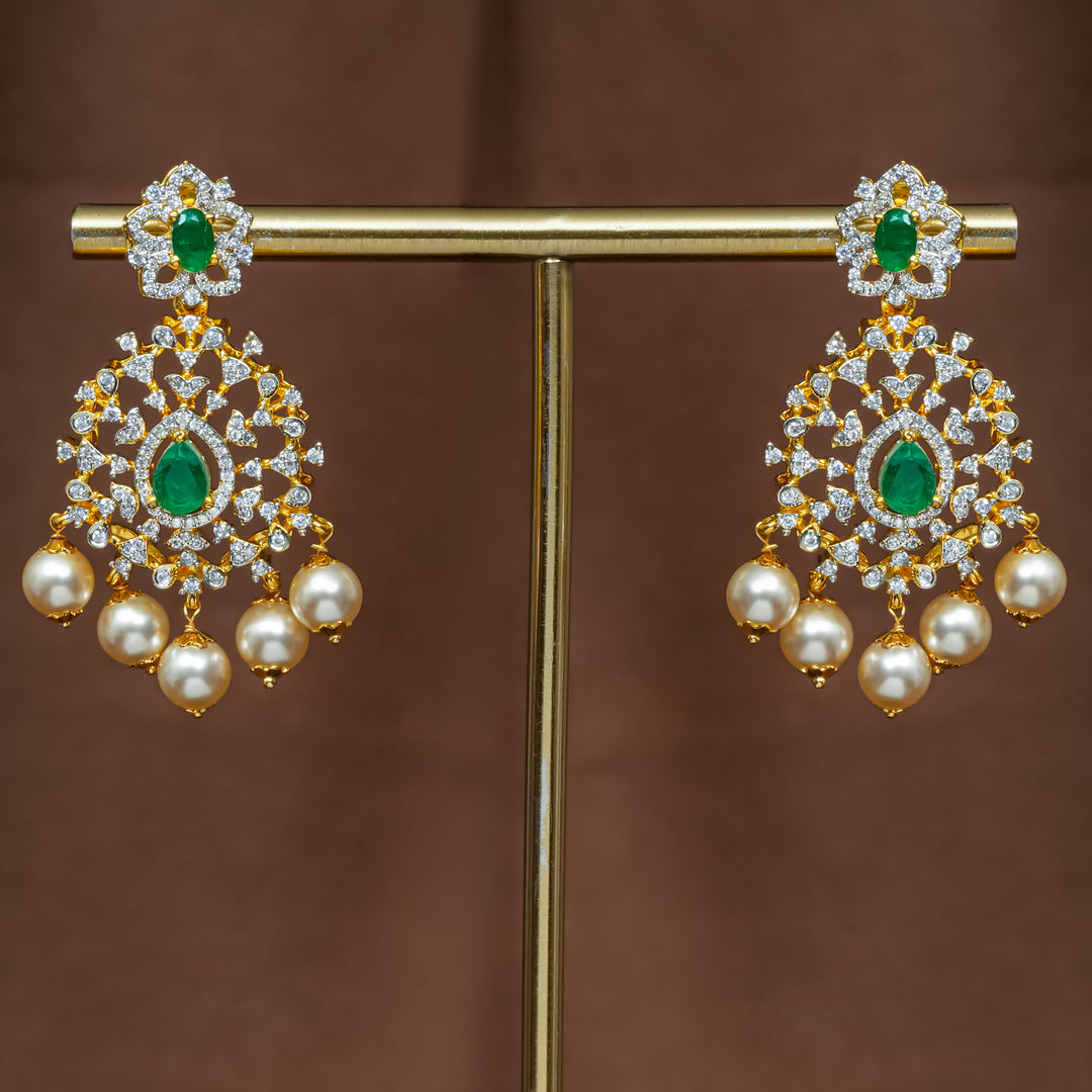 Full view of premium 92.5 silver cz emerald earrings with intricate detailing and pearl drops by Sri Fine Jewellery, Hyderabad (https://srifinejewellery.com)