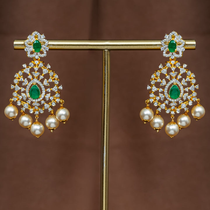 Full view of premium 92.5 silver cz emerald earrings with intricate detailing and pearl drops by Sri Fine Jewellery, Hyderabad (https://srifinejewellery.com)