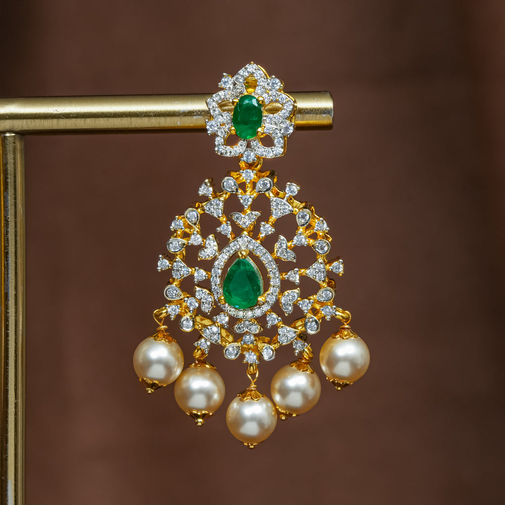 Close-up view of premium 92.5 silver cz emerald earrings with intricate detailing and pearl drops by Sri Fine Jewellery, Hyderabad (https://srifinejewellery.com)