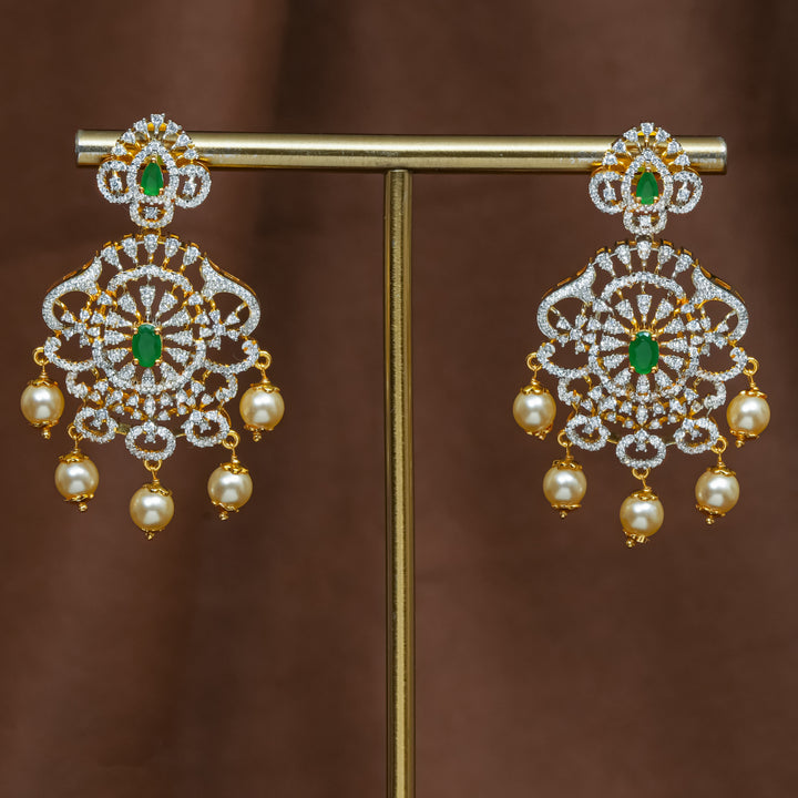Full view of premium 92.5 silver cz emerald earrings with intricate detailing and pearl drops by Sri Fine Jewellery, Hyderabad (https://srifinejewellery.com)