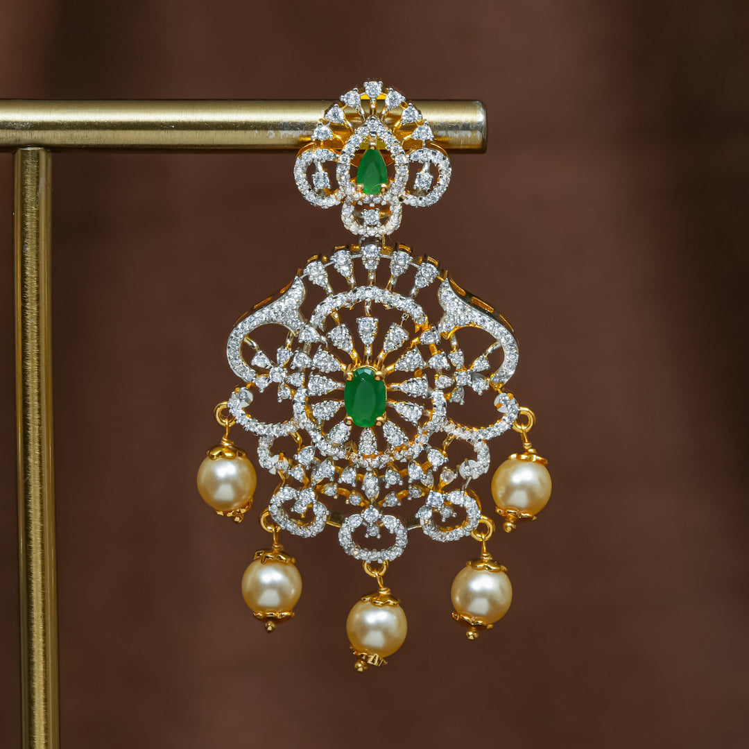 Close-up view of premium 92.5 silver cz emerald earrings with intricate detailing and pearl drops by Sri Fine Jewellery, Hyderabad (https://srifinejewellery.com)