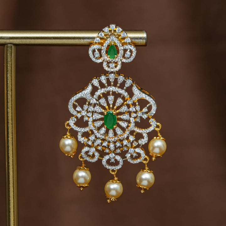 Close-up view of premium 92.5 silver cz emerald earrings with intricate detailing and pearl drops by Sri Fine Jewellery, Hyderabad (https://srifinejewellery.com)
