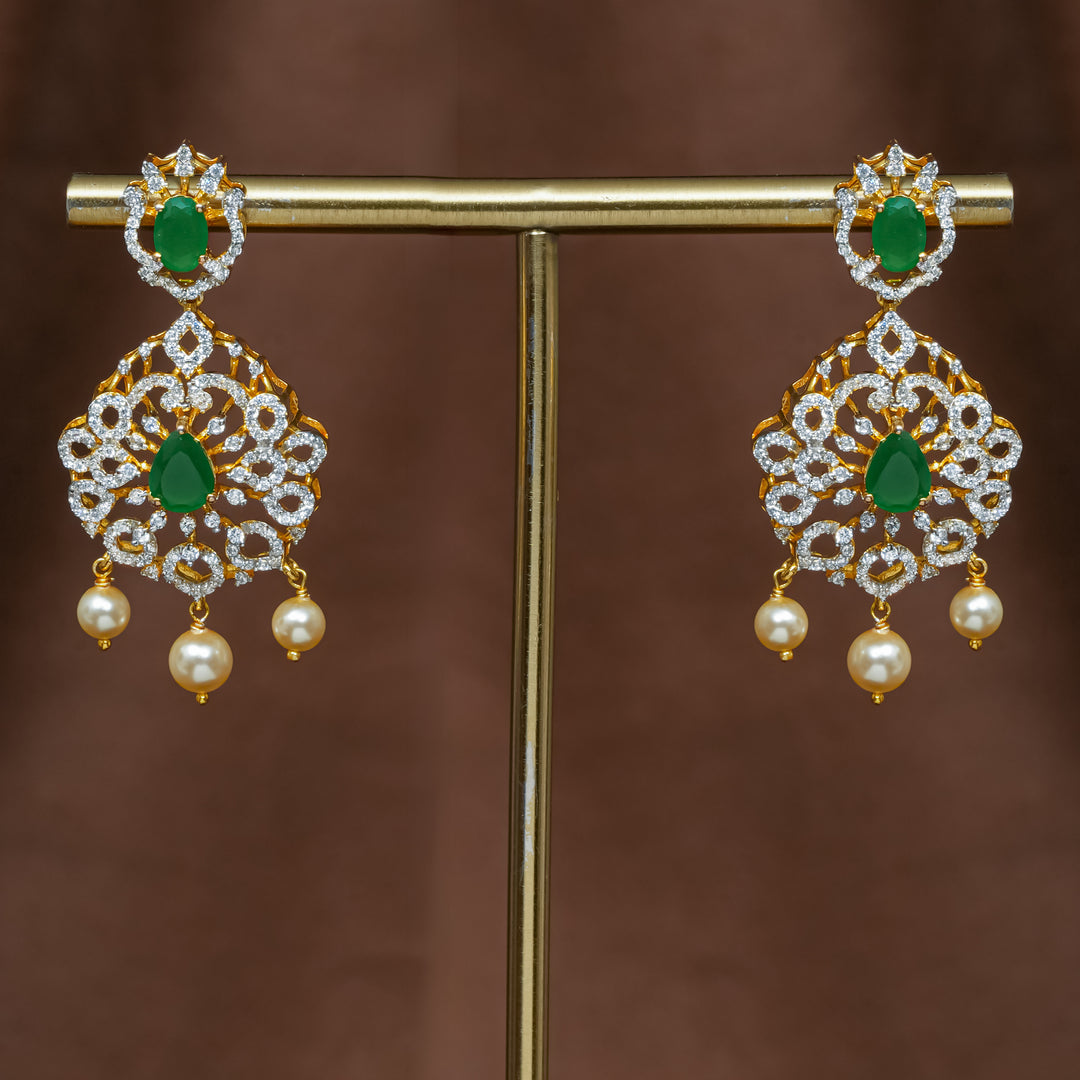 Full view of premium 92.5 silver cz emerald earrings with intricate detailing and pearl drops by Sri Fine Jewellery, Hyderabad (https://srifinejewellery.com)