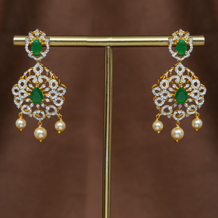 Full view of premium 92.5 silver cz emerald earrings with intricate detailing and pearl drops by Sri Fine Jewellery, Hyderabad (https://srifinejewellery.com)