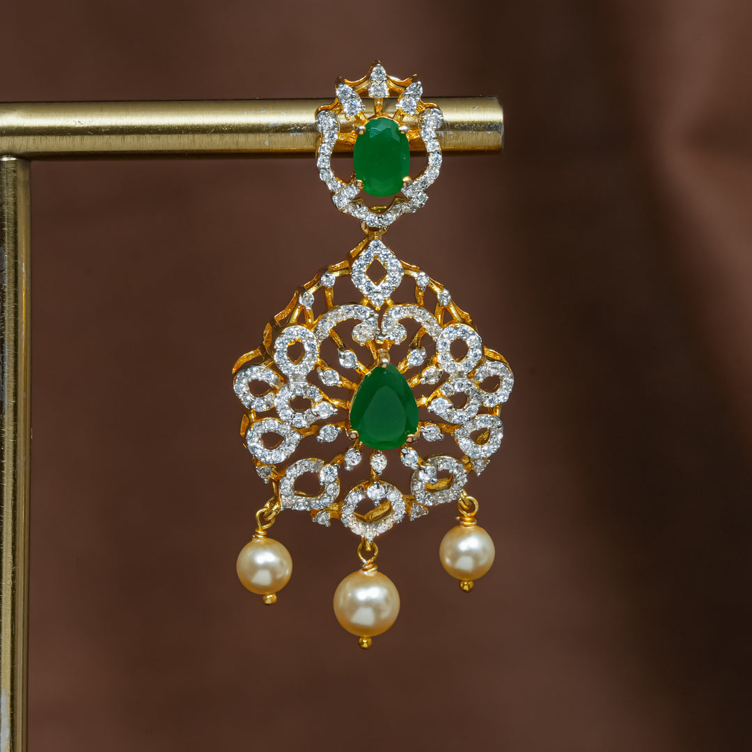 Close-up view of premium 92.5 silver cz emerald earrings with intricate detailing and pearl drops by Sri Fine Jewellery, Hyderabad (https://srifinejewellery.com)