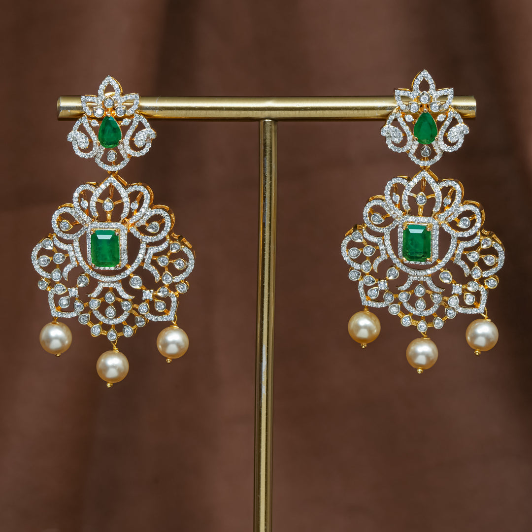 Full view of premium 92.5 silver cz emerald earrings with intricate detailing and pearl drops by Sri Fine Jewellery, Hyderabad (https://srifinejewellery.com)