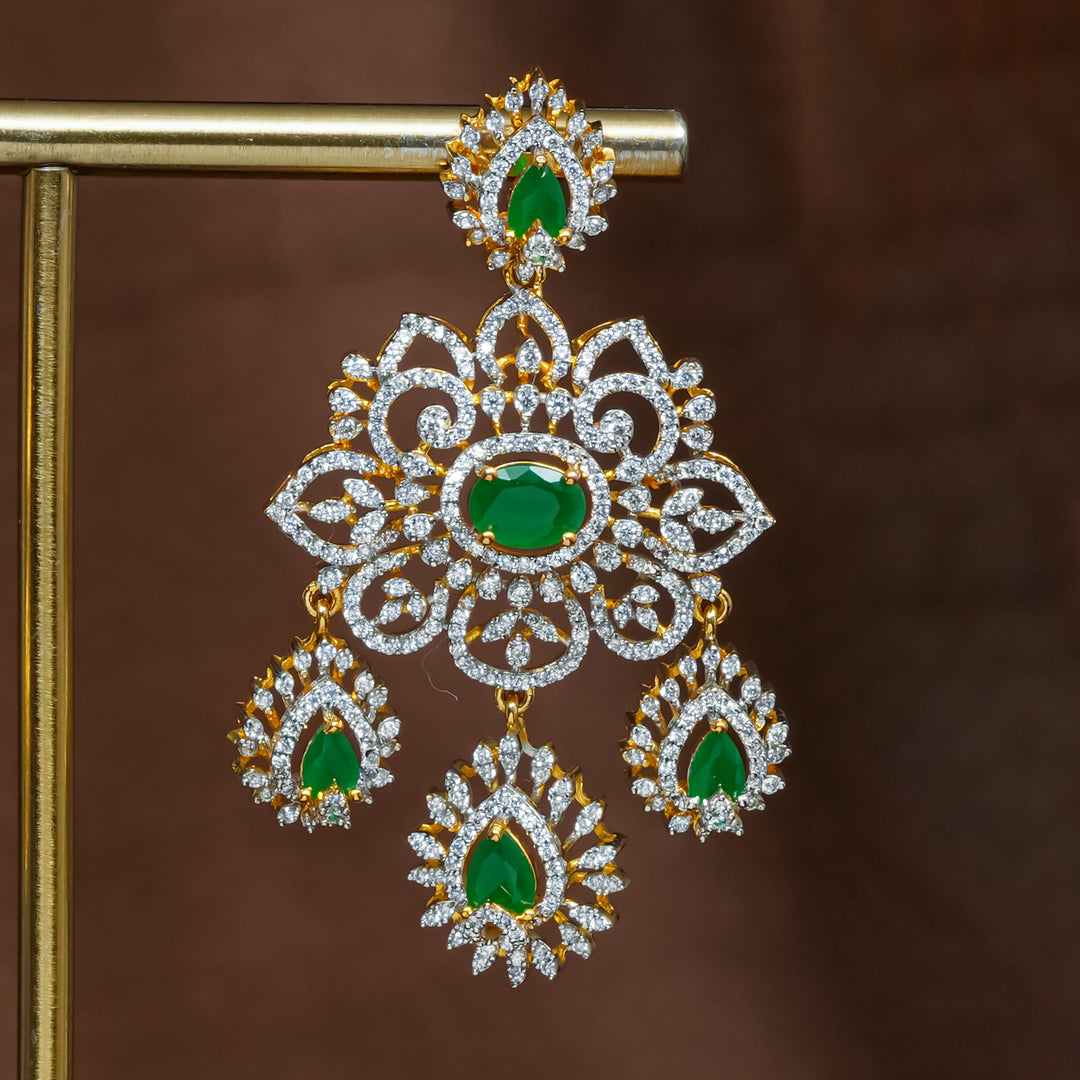 Close-up iew of premium 92.5 silver cz emerald earrings with intricate detailing and pearl drops by Sri Fine Jewellery, Hyderabad (https://srifinejewellery.com)