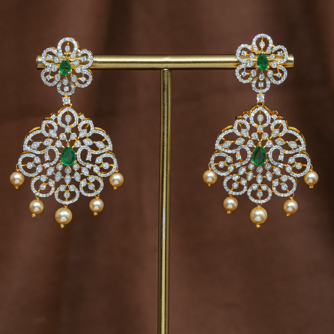 Full view of premium 92.5 silver cz emerald earrings with intricate detailing and pearl drops by Sri Fine Jewellery, Hyderabad (https://srifinejewellery.com)