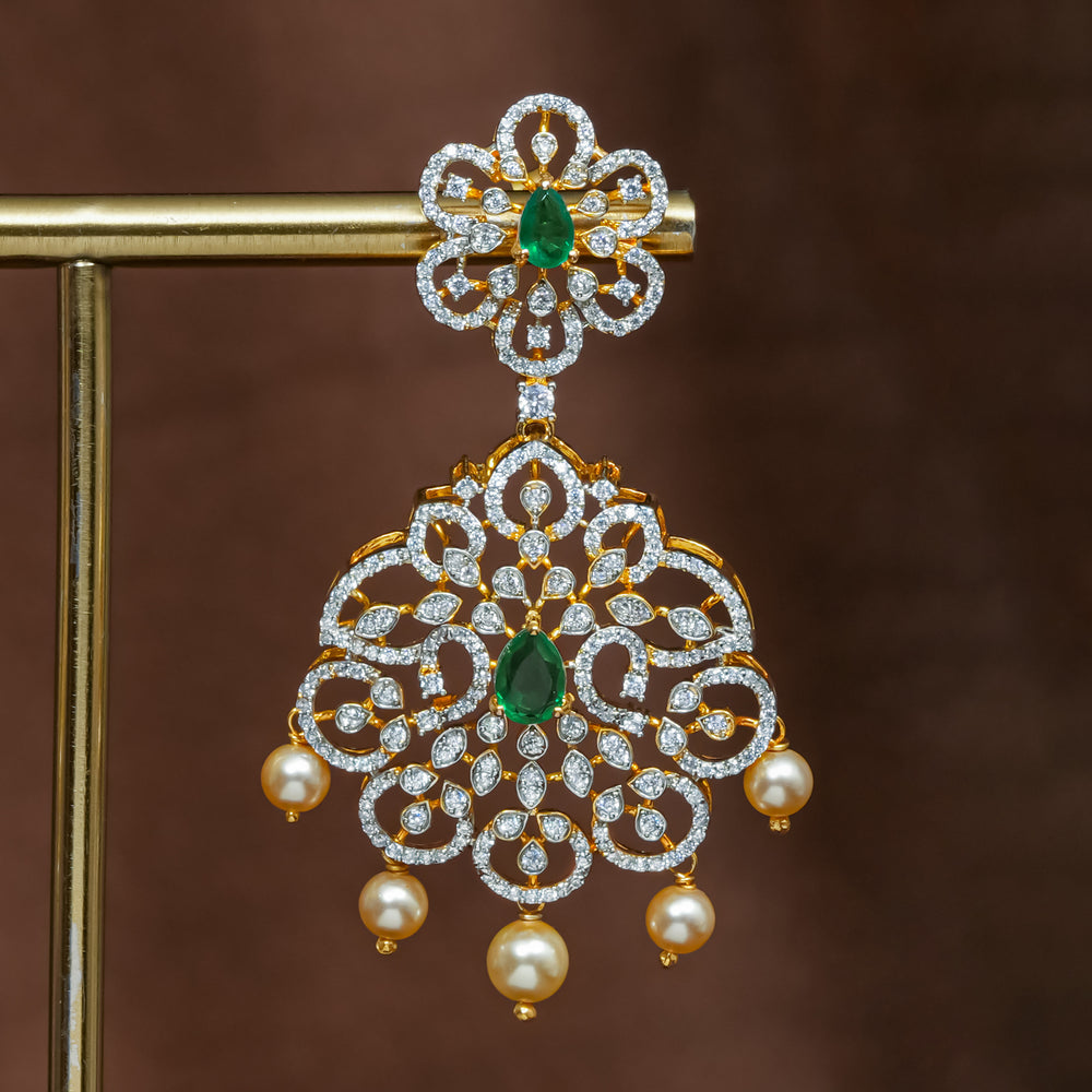 Close-up view of premium 92.5 silver cz emerald earrings with intricate detailing and pearl drops by Sri Fine Jewellery, Hyderabad (https://srifinejewellery.com)