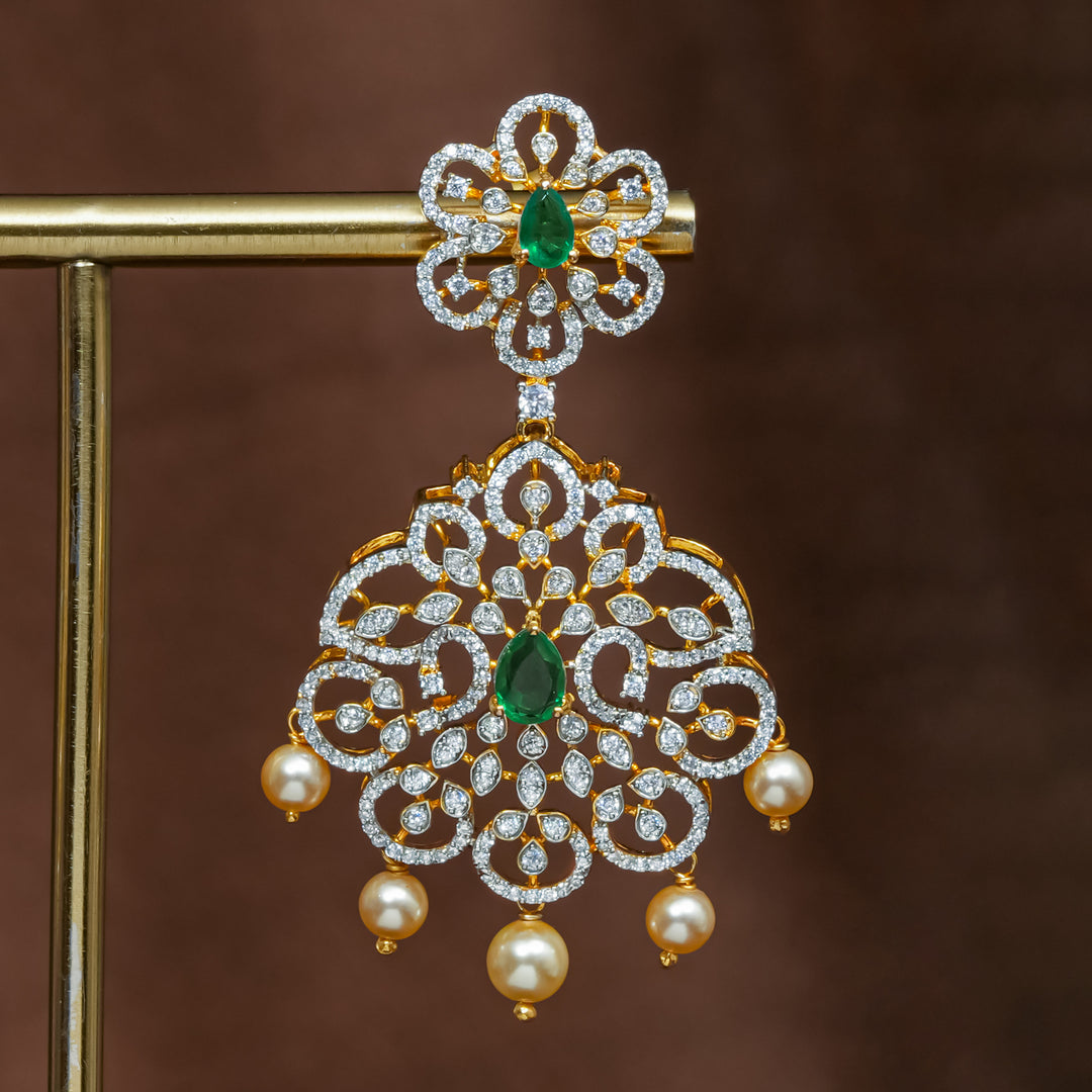 Close-up view of premium 92.5 silver cz emerald earrings with intricate detailing and pearl drops by Sri Fine Jewellery, Hyderabad (https://srifinejewellery.com)