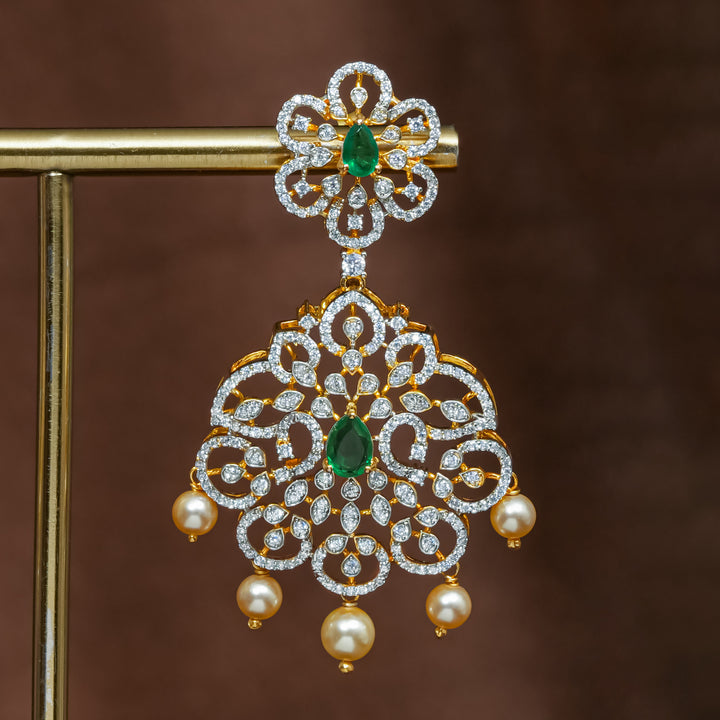 Close-up view of premium 92.5 silver cz emerald earrings with intricate detailing and pearl drops by Sri Fine Jewellery, Hyderabad (https://srifinejewellery.com)