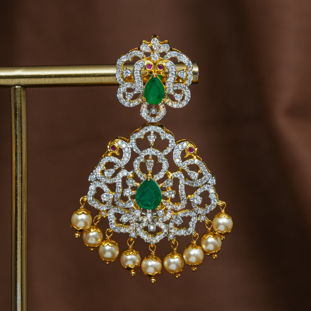 Full view of premium 92.5 silver cz emerald earrings with intricate peacock design detailing and pearl drops by Sri Fine Jewellery, Hyderabad (https://srifinejewellery.com)
